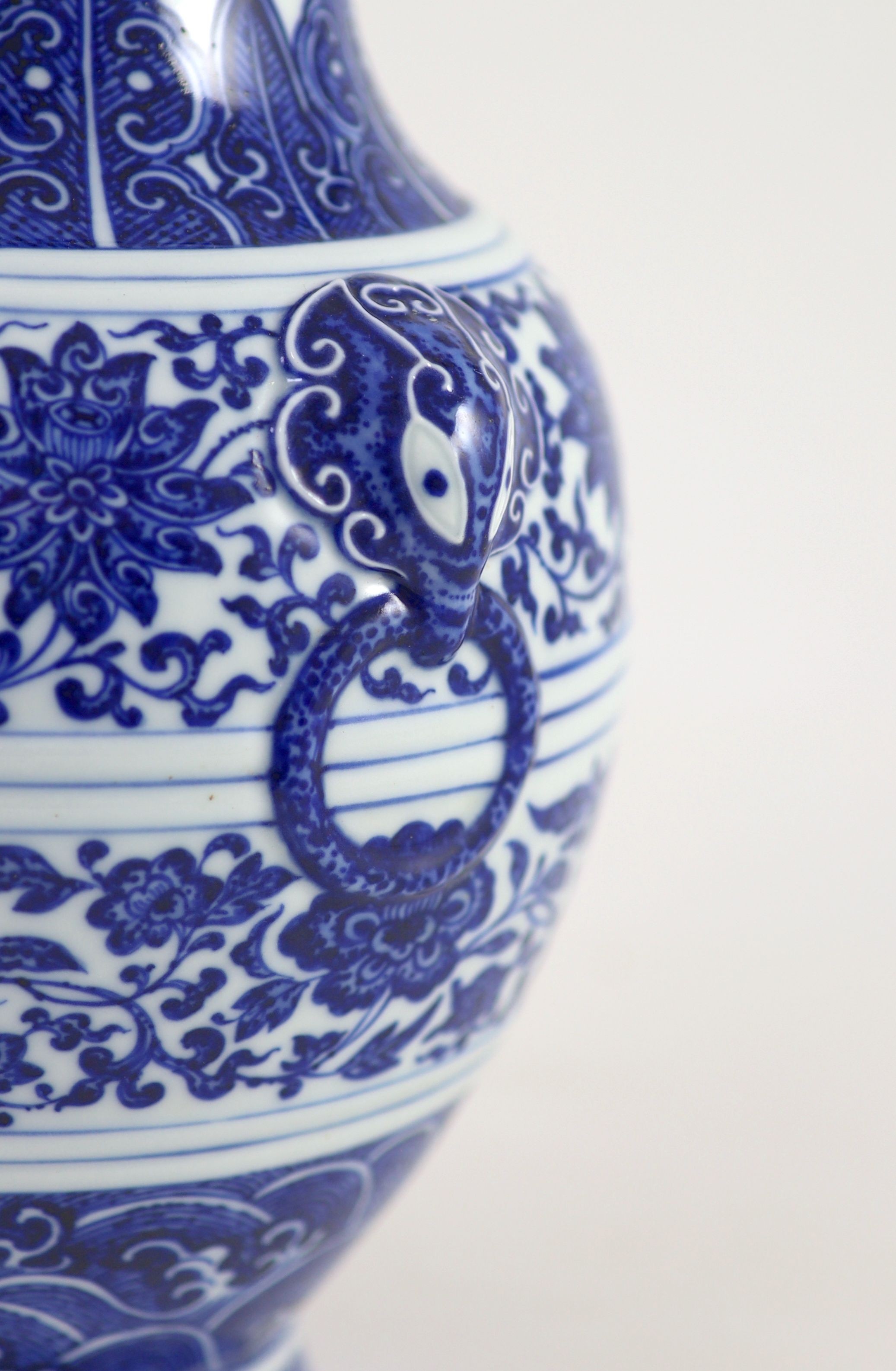 A Chinese archaistic blue and white vase, hu, Qianlong mark and possibly of the period, 25 cm high